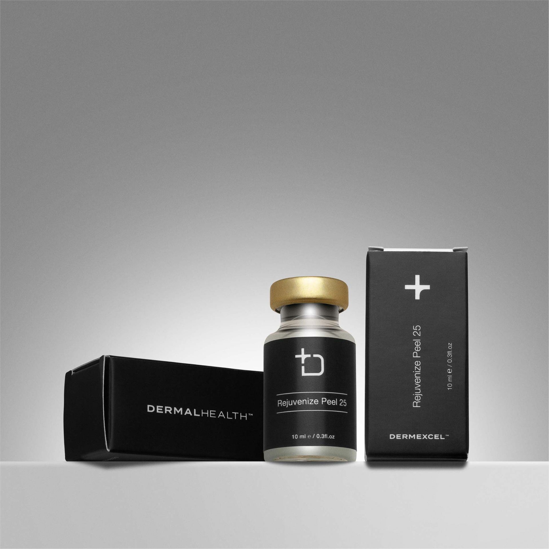 Skincare product set including cleanser and serum in black packaging